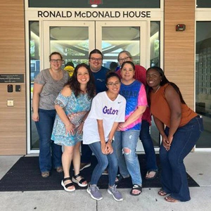 CAMPUS Employees at a community event