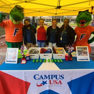 CAMPUS Employees at a community event