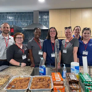 CAMPUS Employees at a community event