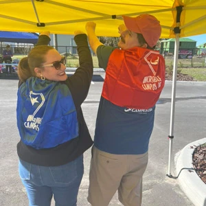 CAMPUS Employees at a community event